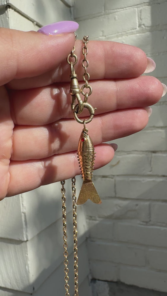 
            
                Load and play video in Gallery viewer, Vintage Solid 18k Articulated Fish with Ruby Eyes
            
        